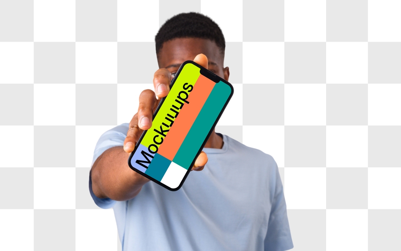 African-American man holding iPhone mockup in light blue shirt on transparent background for digital design template