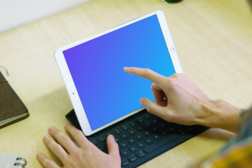User tapping on iPad Mockup