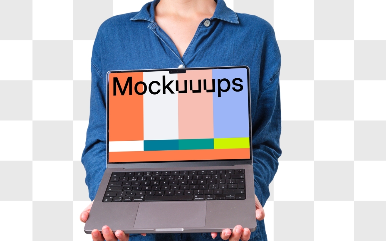 Woman with short hair in denim shirt holding MacBook Pro mockup with transparent background for professional presentations