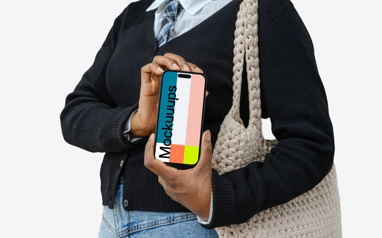 Female hands holding iPhone Pro mockup with transparent background - device mockup template for modern design presentations