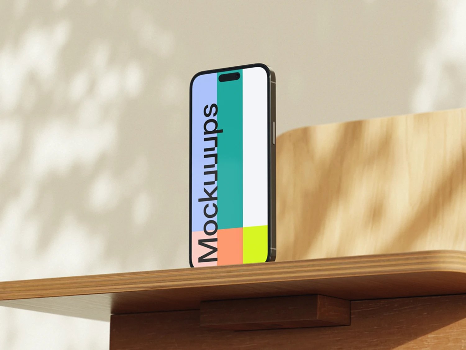 Free iPhone 17 wooden desk mockup