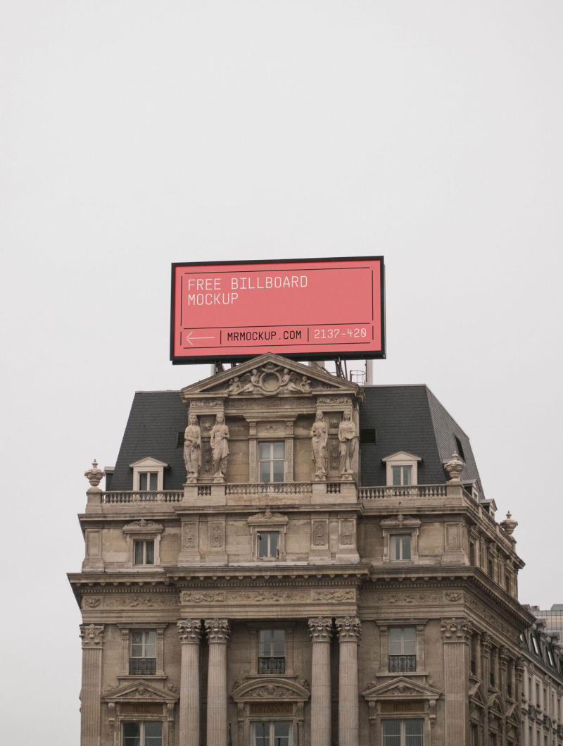 Billboard mockup on top of a historic Parisian building