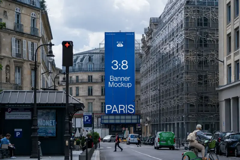 Vertical banner mockup on a building facade in a busy Paris street